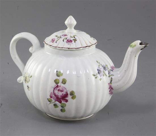 A rare Derby ribbed globular teapot and cover, c.1758, l. 19cm, old metal repair to spout tip